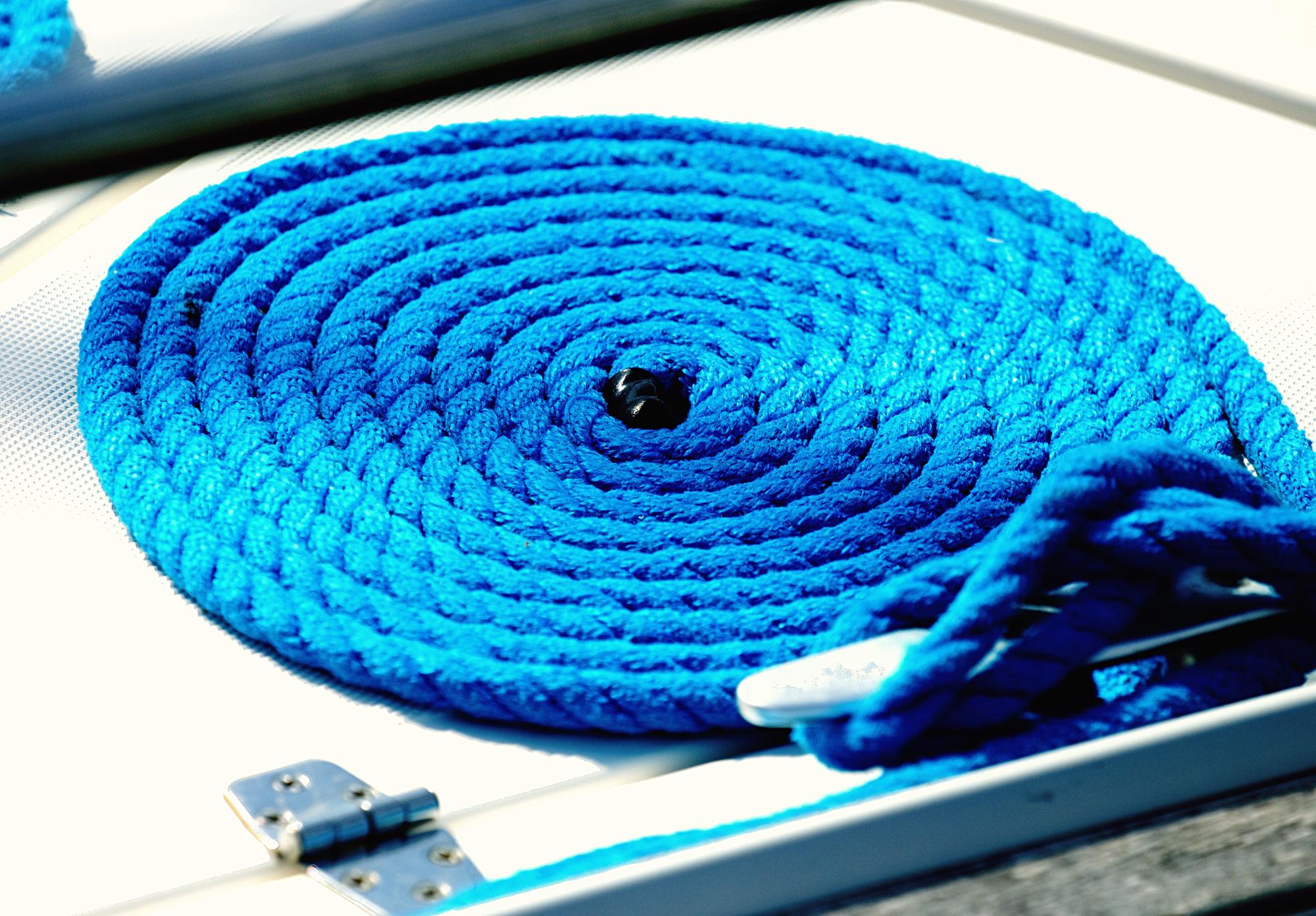 Close-up of blue tech embroidery with neon thread